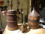 Butter Churn & Wood Covered Jug