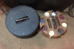 Two Sets of Poker Chips in Wood Racks