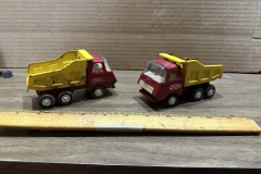 Red and Yellow Toy Dump Trucks